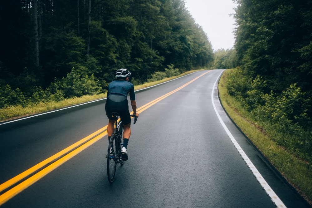 cyclist-man-riding-bike-road